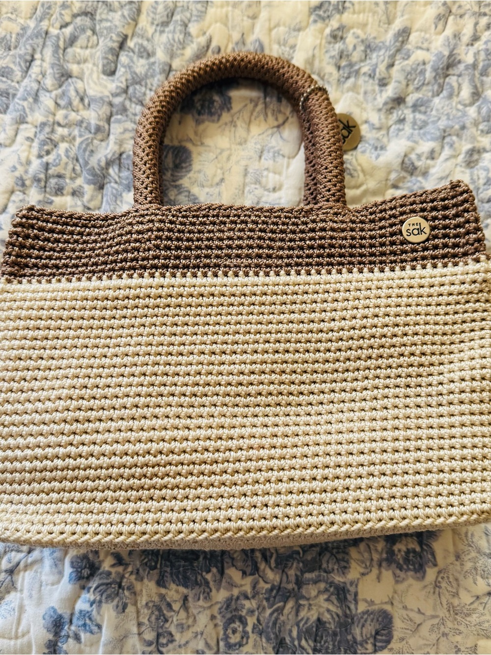 The Sak Crochet Two-Tone Tote hand bag  in Brown and Cream